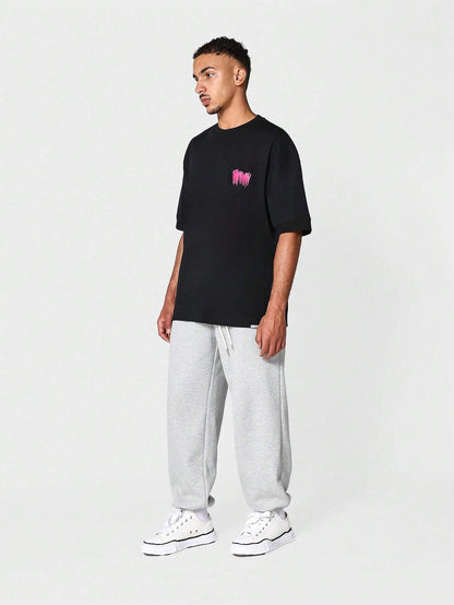 SUMWON Oversized Short Sleeve Tee with Graffiti Graphic Print