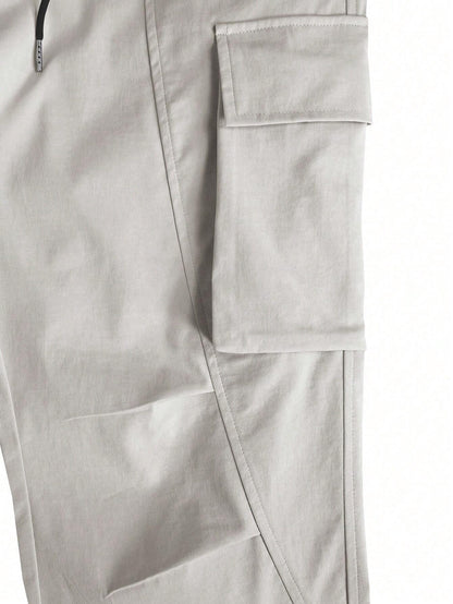Manfinity LEGND Loose-Fitting Men'S Solid Color Cargo Pants with Drawstring Waist and Pockets