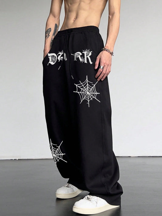 Manfinity EMRG Men'S Casual Spider Web & Letter Printed Sweatpants with Drawstring Waist and Slant Pockets, Halloween Graphic Going Out Long Baggy Sweatpants, for Husband, Boyfriend Gifts, for Rave