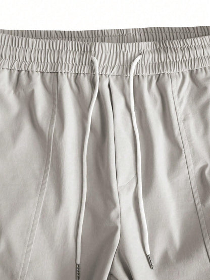 Manfinity LEGND Loose-Fitting Men'S Solid Color Cargo Pants with Drawstring Waist and Pockets